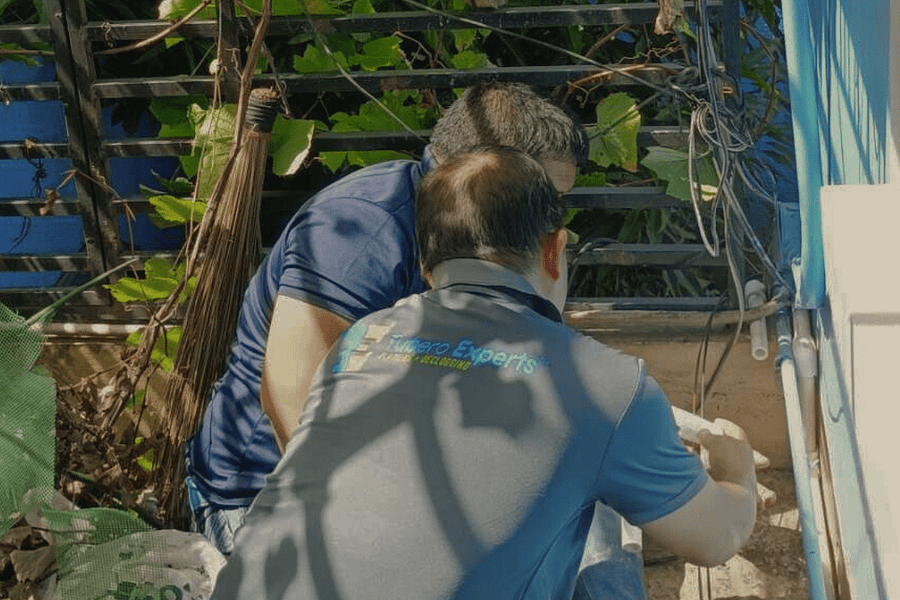 two plumbers working together